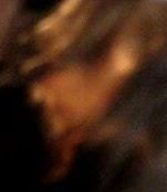 man facing left in hat and red scarf.jpg